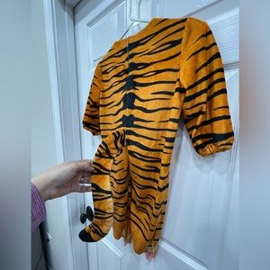 UNDERWRAPS BABY TIGER COSTUME, bodysuit only. Size 2-4 years. 31” length.